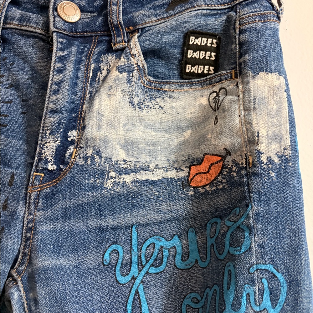 Distressed Blue Graphic Women’s Jeans with Patch & Embroidery - Picture 6 of 10
